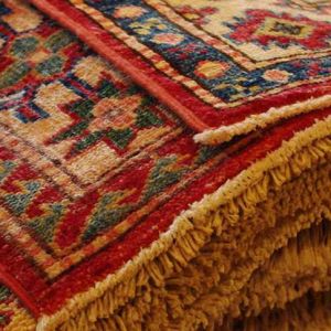 آیا شیرازه دوزی فرش به طول عمر فرش کمک می‌کند؟
